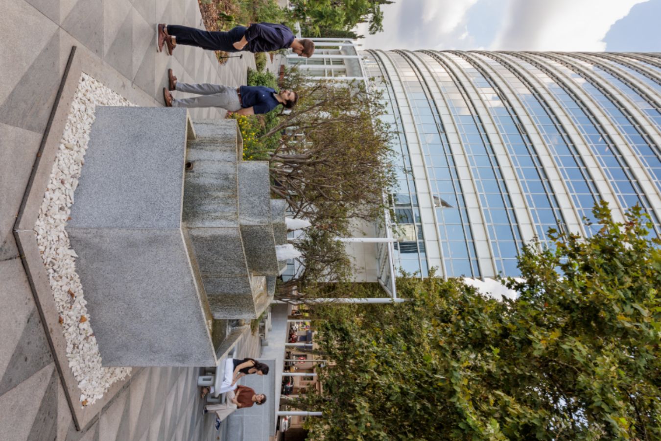 Edificio Republica - Tiered stone water fountain feature in the main building plaza - Contract Workplaces.jpg